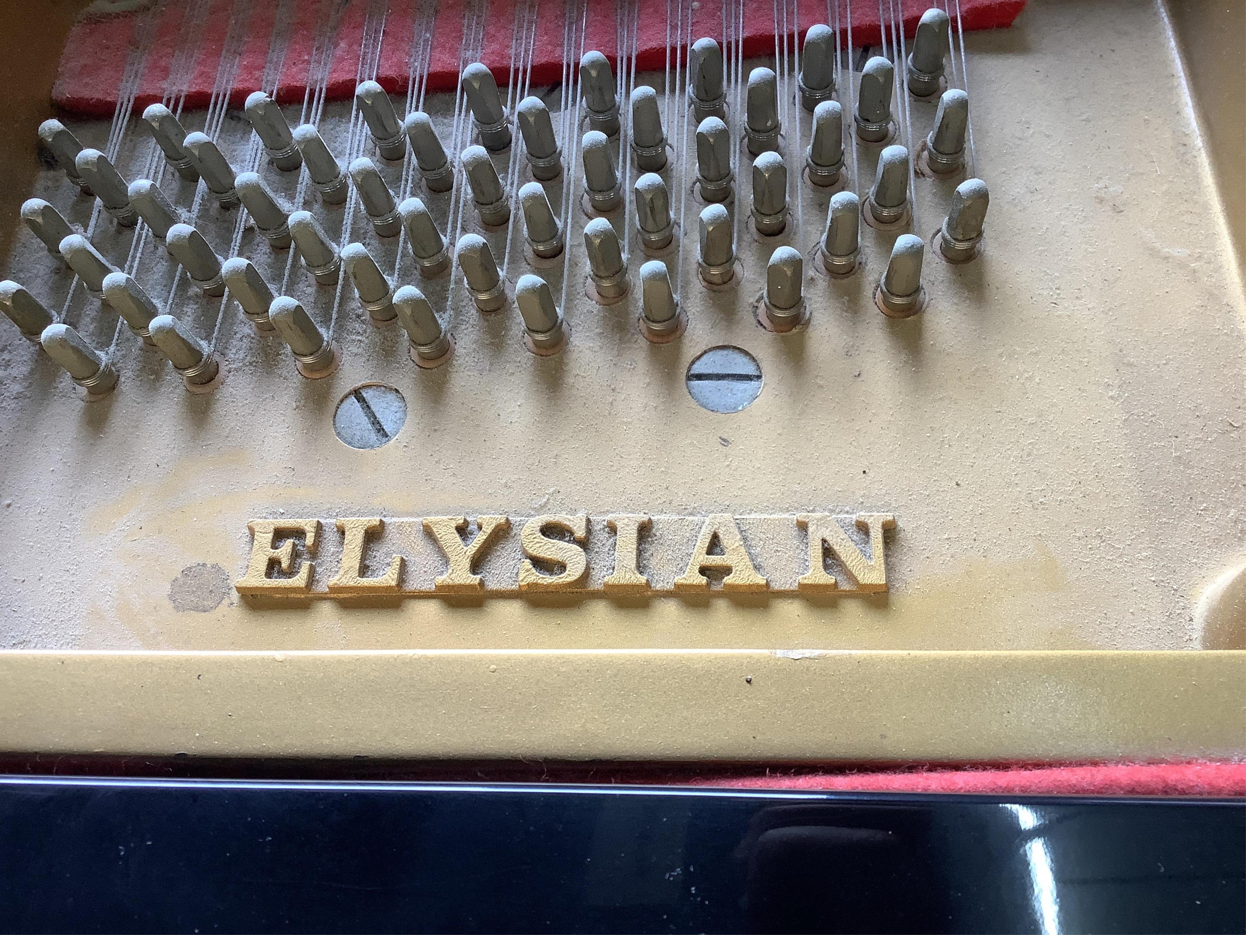 A modern Elysian ebonised baby grand piano, length 160cm, width 148cm, height 101cm, and a duet stool. Condition - good